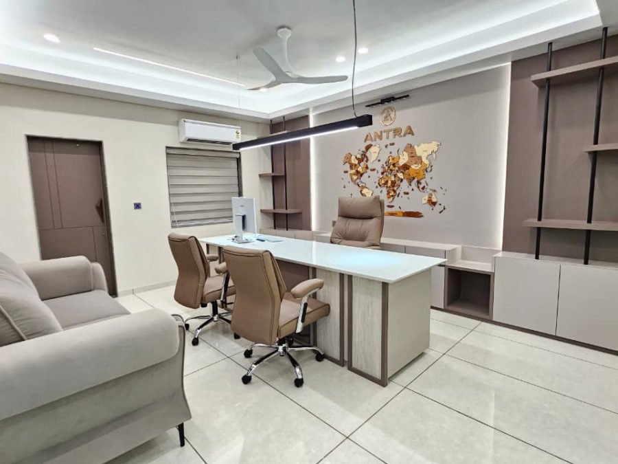 Antra front office meeting room with a meeting table, seating and display shelving